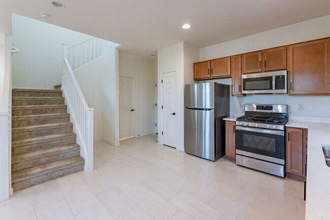 Building Photo - Three Bedrooms! Newer Neighborhood - conve...