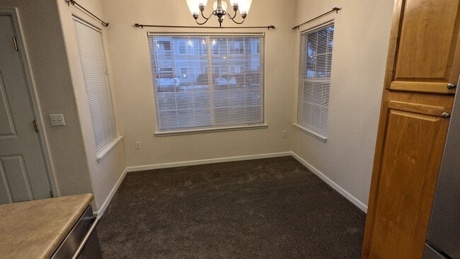 Building Photo - AWESOME 2-BEDROOM CONDO INCL. GARAGE, SWIM...