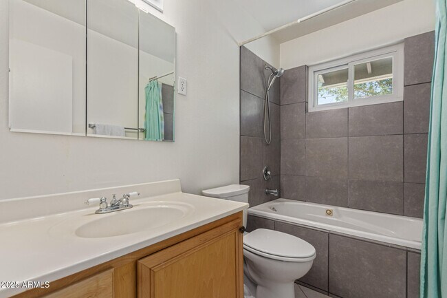 Building Photo - 12640 N Pebble Beach Dr