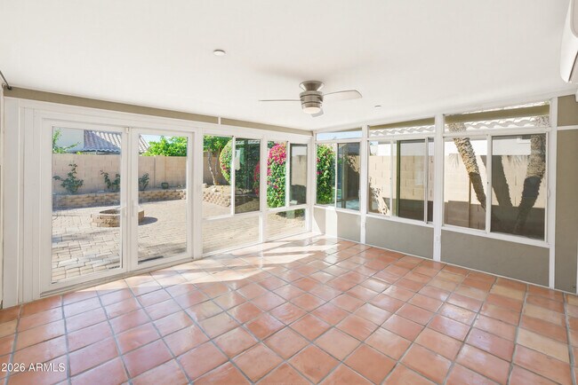 Building Photo - 9321 E Caribbean Ln