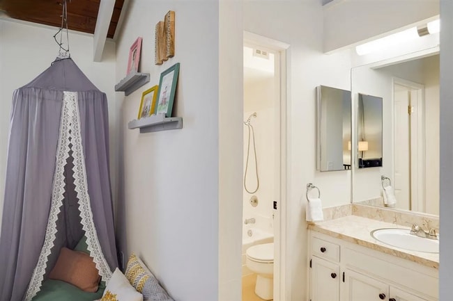 Building Photo - Spacious 1,550 Sq Ft Townhome | 2-Car Garage & High Ceilings w/ Exposed Beams