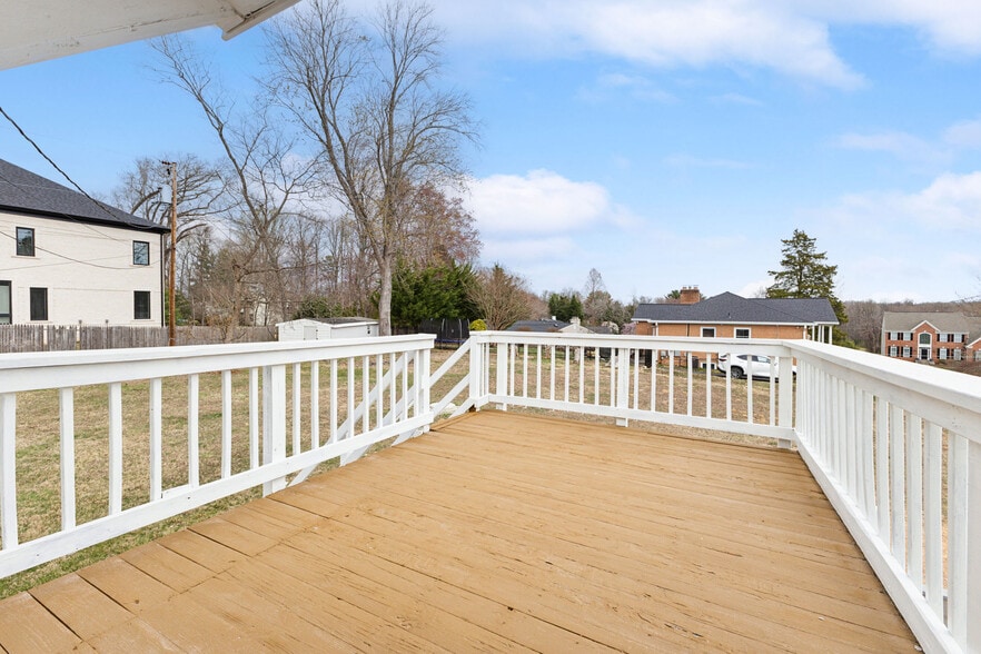 Bedroom 1 with walk out to Secondary Upper Deck - 10828 Miller Rd
