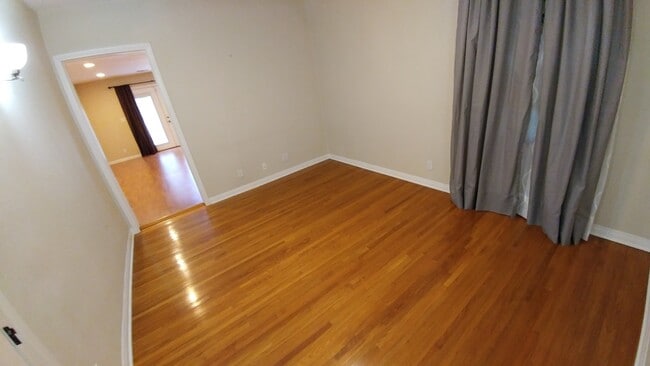 Building Photo - Gorgeous and Spacious 3-Bedroom 2-Bath home with Built-In BBQ, Garage, Hardwood Floors & Yard! MO...