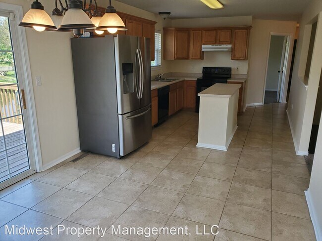 Building Photo - 4 br, 3 bath House - 6191 N Gregory Dr