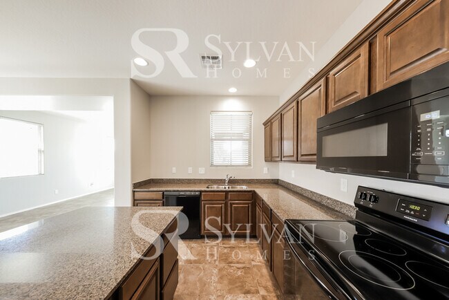 Building Photo - This home exudes a cheerful and welcoming charm!