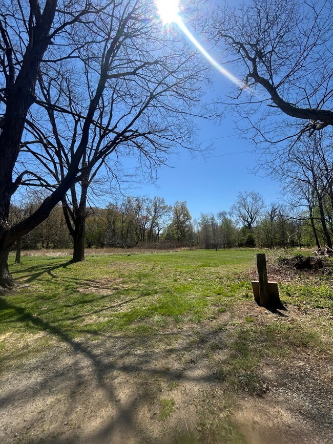 Building Photo - Charming Newly Renovated 2-Bedroom Home on 3 Acres – A Gardener’s Dream!