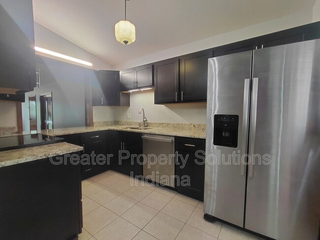 Building Photo - 2312 W 65th Ave
