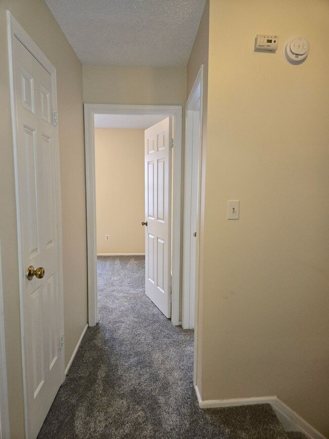Building Photo - Recently painted & carpeted townhouse with 1,200+ SQ FT, 3-bedroom, 2.5 bathroom and lots of amen...
