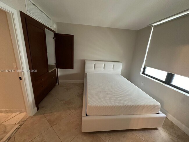 Building Photo - 9801 Collins Ave