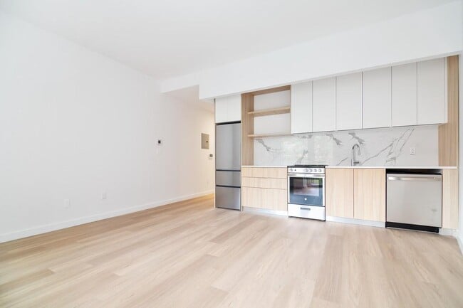 Building Photo - 7182-82 Parsons Blvd