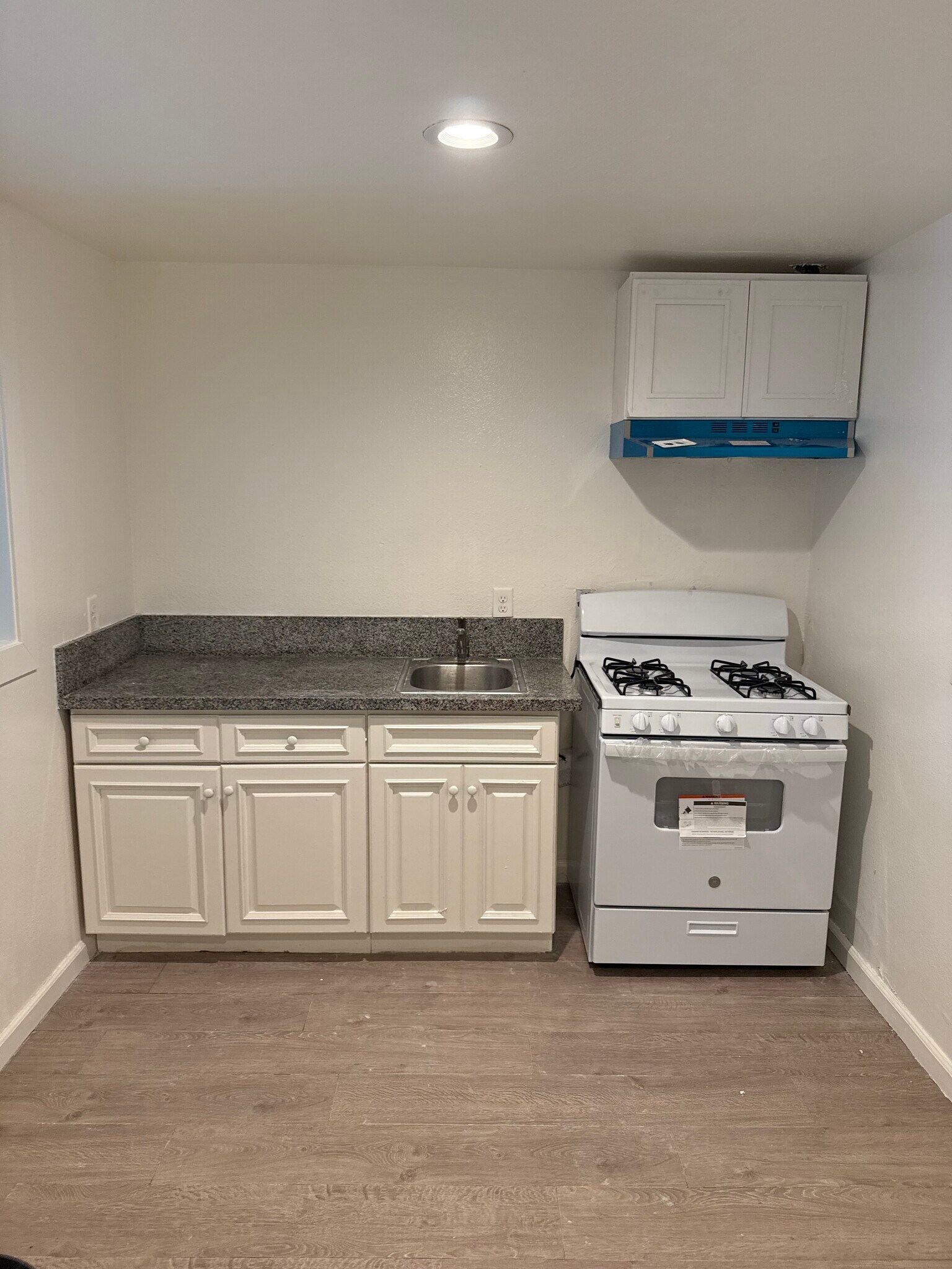 New range hood - 10952 Rose St