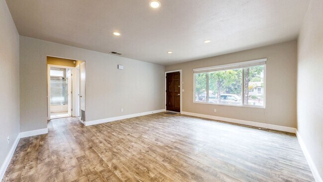 Building Photo - Bright 2 Bedroom, 1 Bathroom Single Family Home! Attached 2 Car Garage and Landscaping Included!