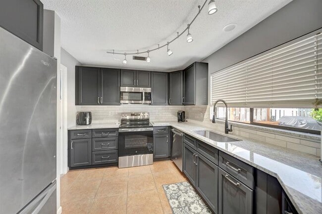 Building Photo - 9743 Saratoga Park Ct