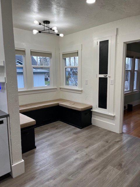 wrap around bench seat with storage in kitchen nook - 810 E Magnolia Ave