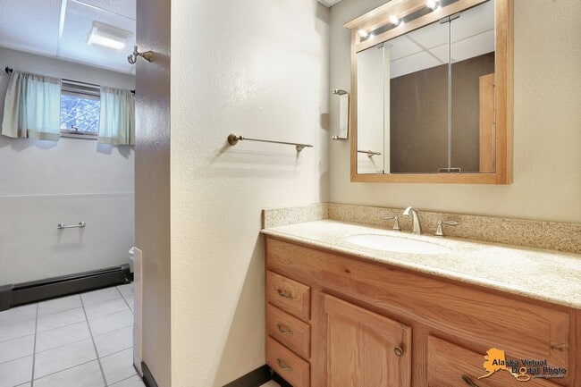 Building Photo - Spacious Home with Garage & Fenced Yard Near JBER & Major Hospitals