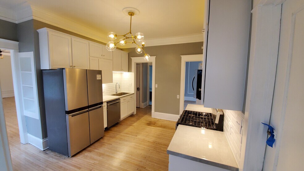 Main Kitchen, it actually has an island now - 1400 N Girard Ave N