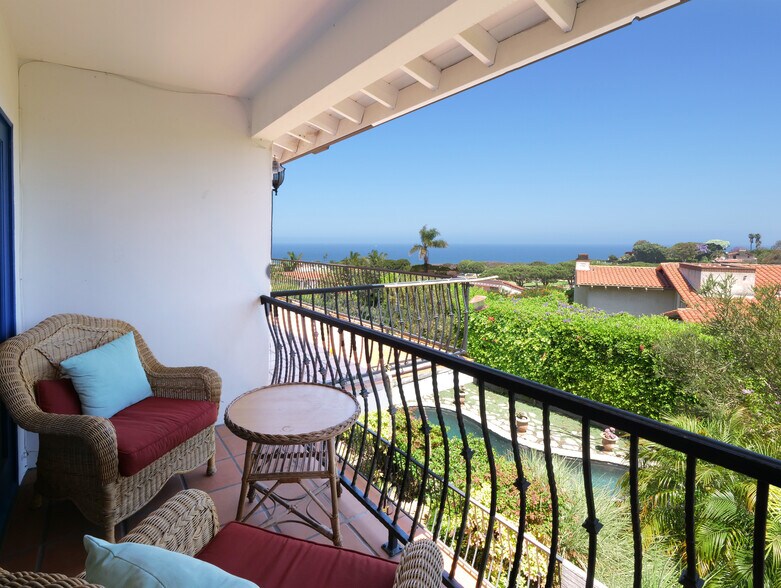 Private view balcony off primary bedroom - 345 Palos Verdes Dr W
