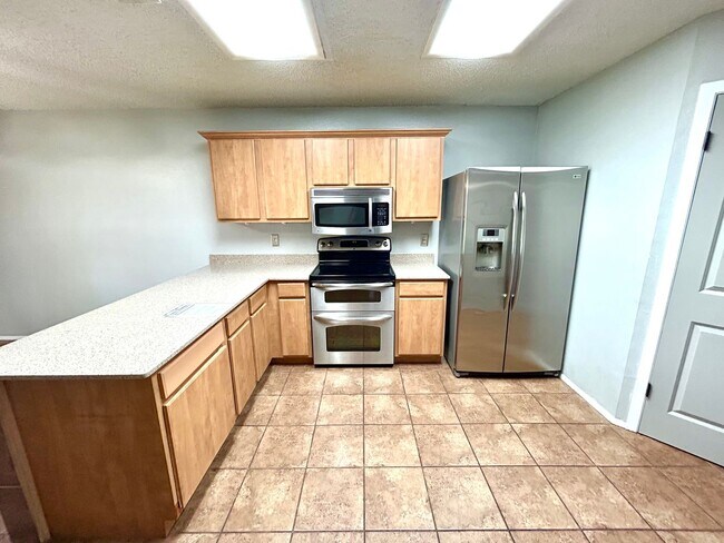 Building Photo - *COMING SOON* Energy-Efficient 4BR Home w/ Solar Panels, Loft & Backyard Oasis!