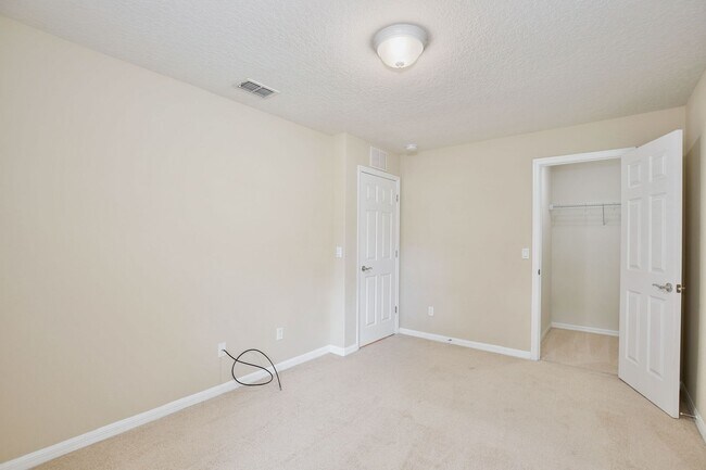 Building Photo - Gorgeous 2/2 + Den Mediterranean Villa with Waterfront Screened Patio and 2-Car Garage in the Pre...