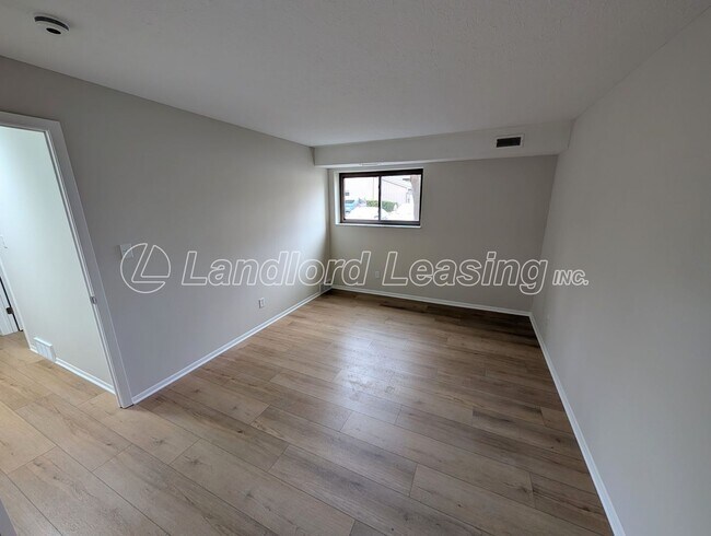 Building Photo - Reduced Price on this Updated 2-Bedroom Condo Steps from Crocker Park – Pool & Clubhouse
