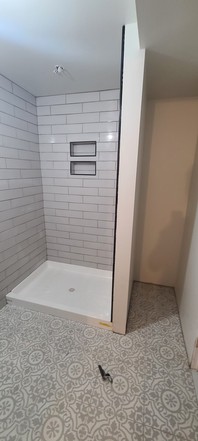 Remodeled bathrooms - 4801 College Ave