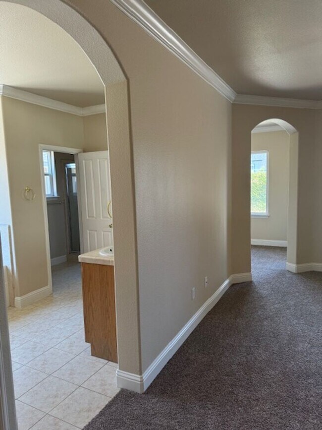 Building Photo - Enterprise Neighborhood 3 Bedroom Home with bonus room and 3 car garage- Landscaping Included!