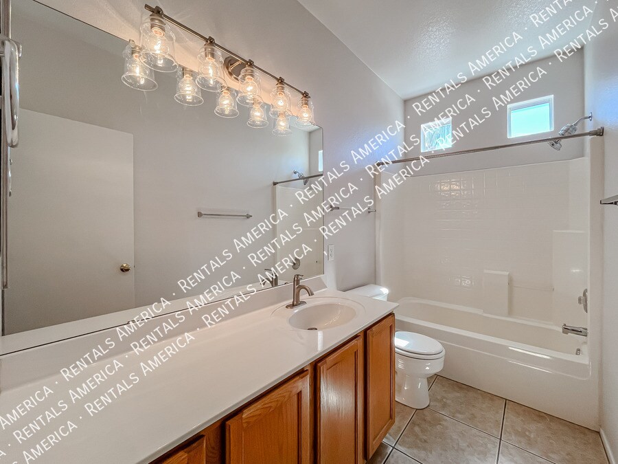 Building Photo - 9765 E Knowles Ave