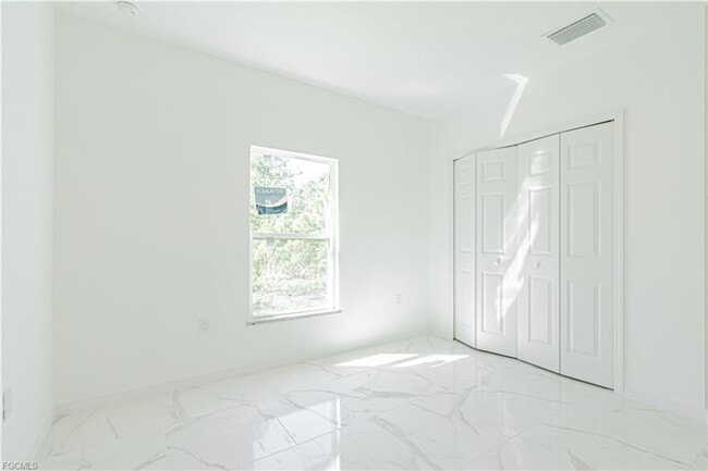 Building Photo - AVAILABLE NOW-TROPIC ACRES-THREE BEDROOM TWO BATH SINGLE FAMILY HOME.