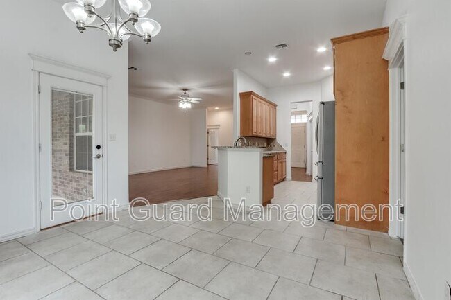 Building Photo - 10517 Queensbury Dr