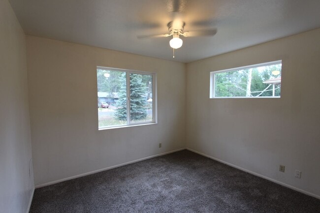 Building Photo - COMING AUGUST | 3-Bedroom Home in Bow & Arrow Acres | Large Yard + Wood-Burning Fireplace