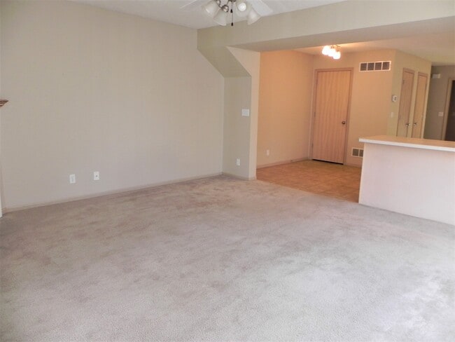 Great room - 9840 N Lewis Ave