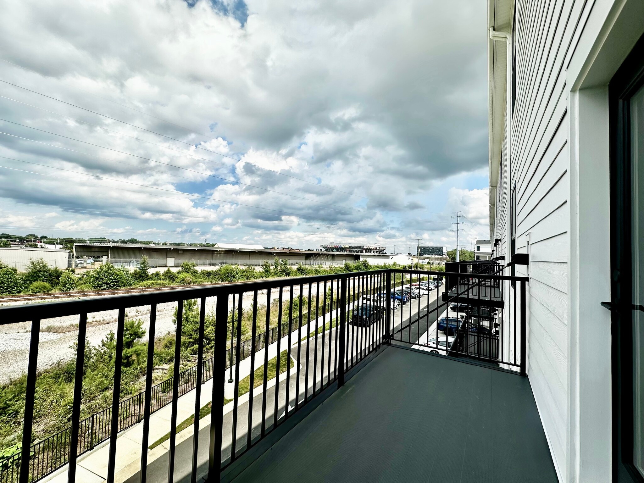 Private balcony view of baseball stadium and Diamond District - 3446 Carlton St