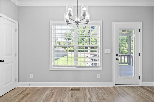 Building Photo - Pet Friendly Three Bedroom with Bonus!