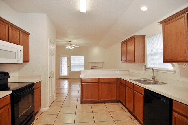 Building Photo - "Warm And Welcoming 3-2-2 With Open Living In a Prime Location!"