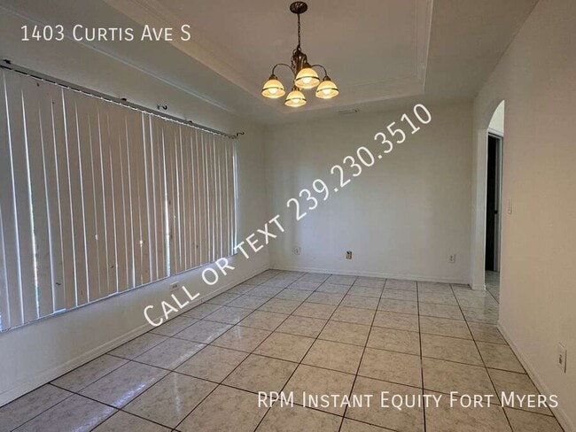 Building Photo - 1403 Curtis Ave S