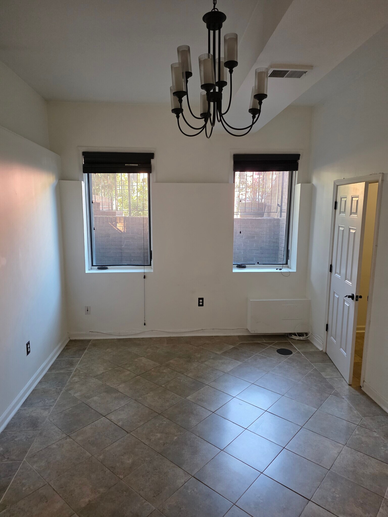 Second bedroom looking out front windows. - 46 N St NW