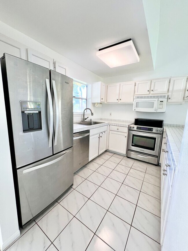 Building Photo - Long-Term Rental – 2 Bedroom, 2 Bath Condo...