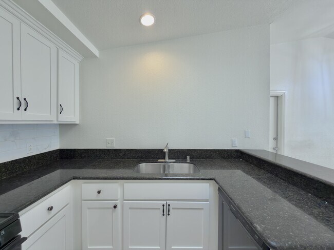 Building Photo - 7880 Pinyon Ave