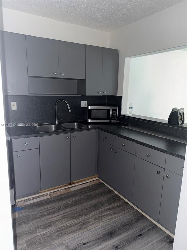 Building Photo - 6070 W 18th Ave