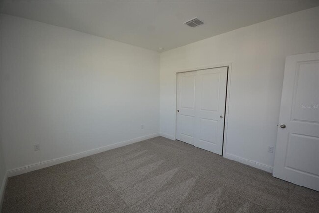 Building Photo - 5144 Firebush Dr