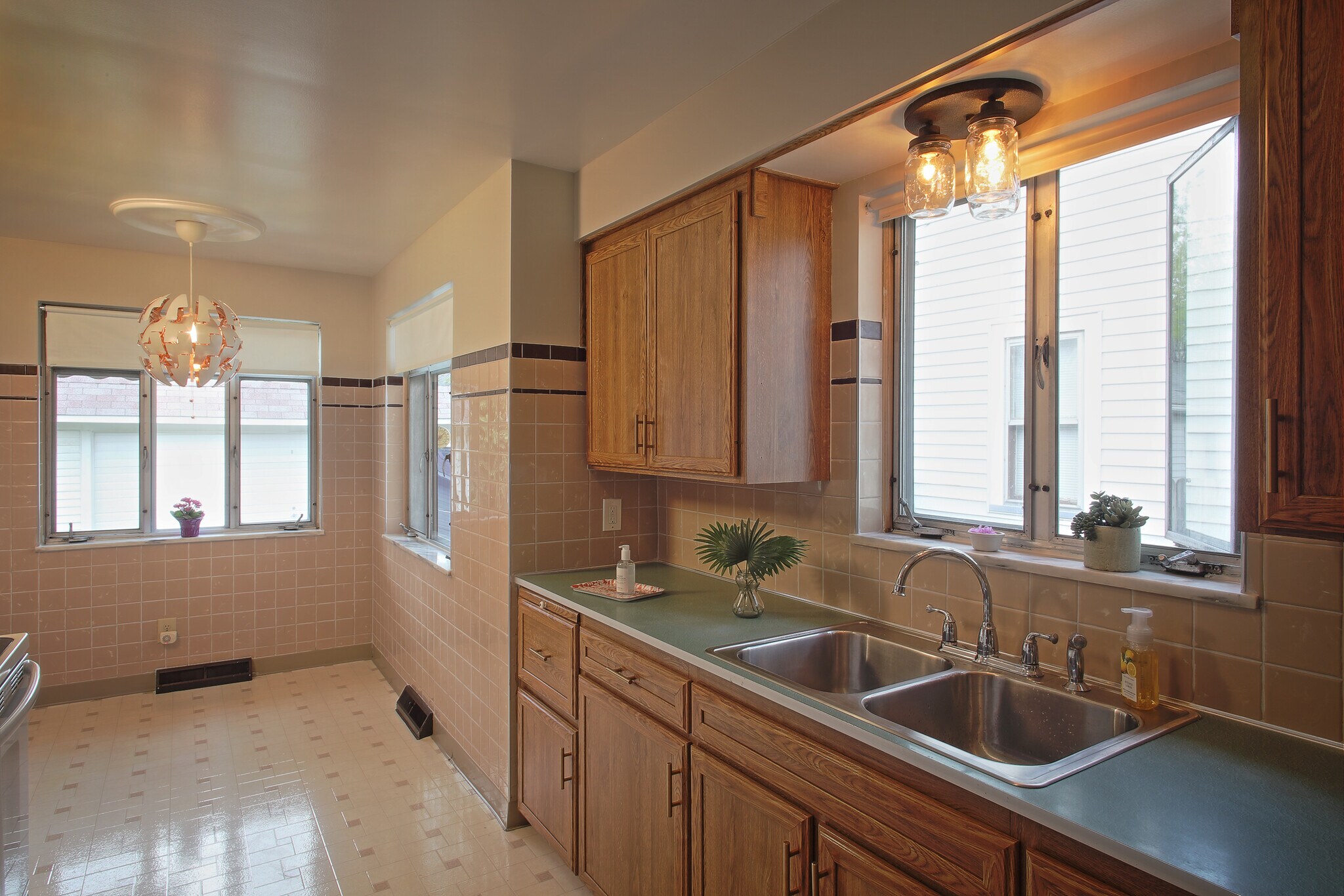 Kitchen with charming breakfast nook - 2186 Chesterland Ave