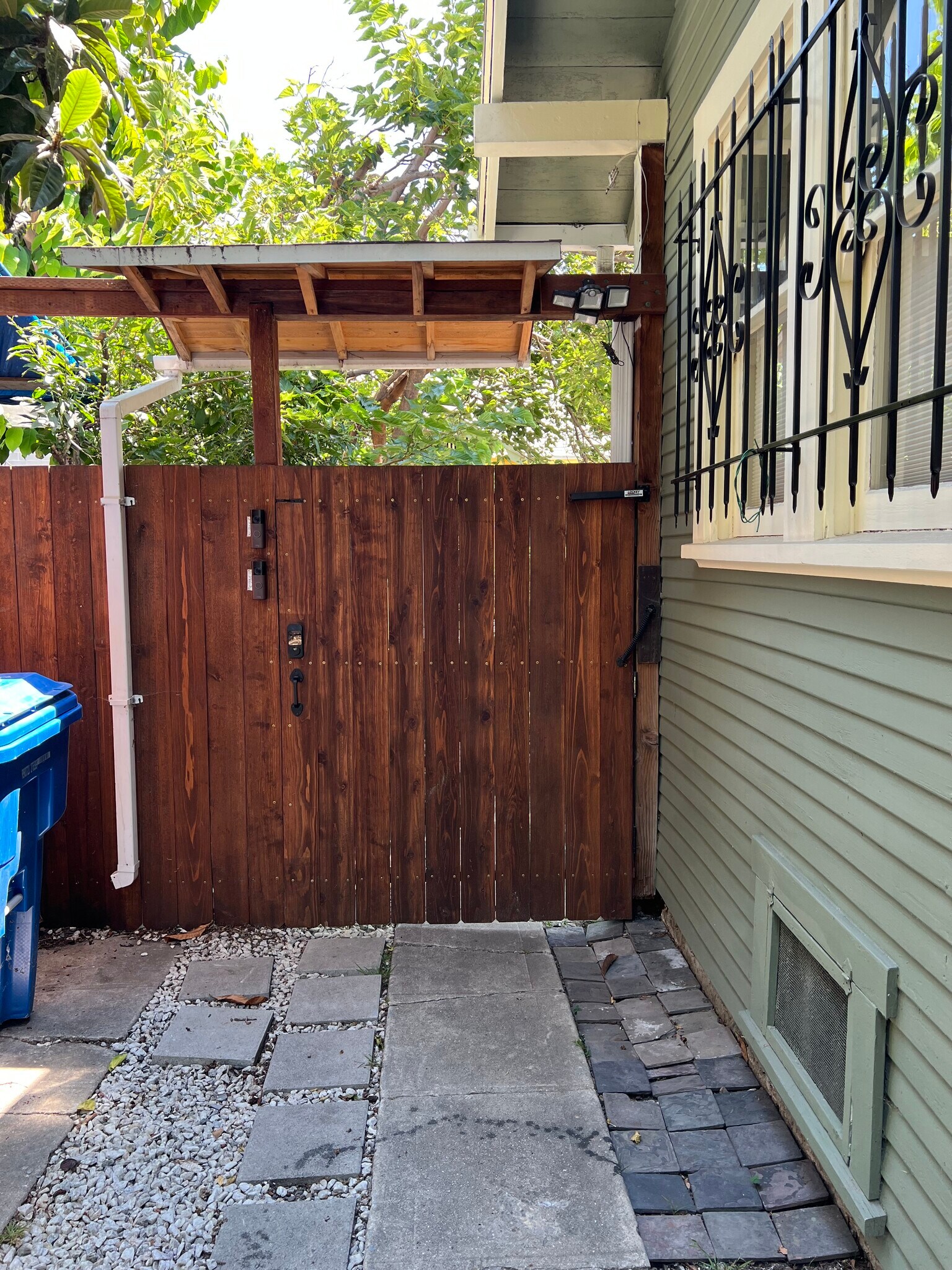 Gate to yard and guesthouses - 5714 Virginia Ave