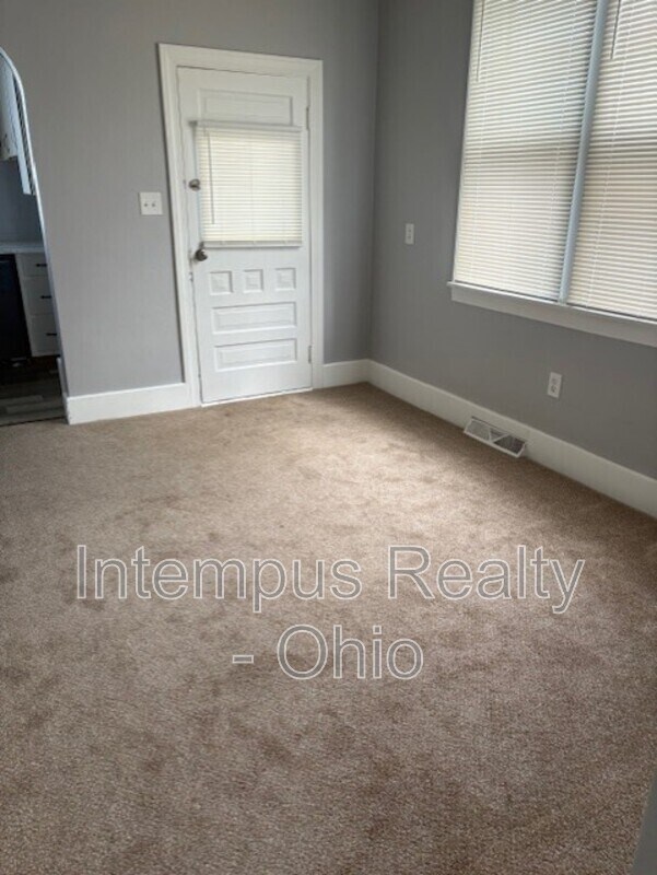 Building Photo - 112 E. Second Street - Down