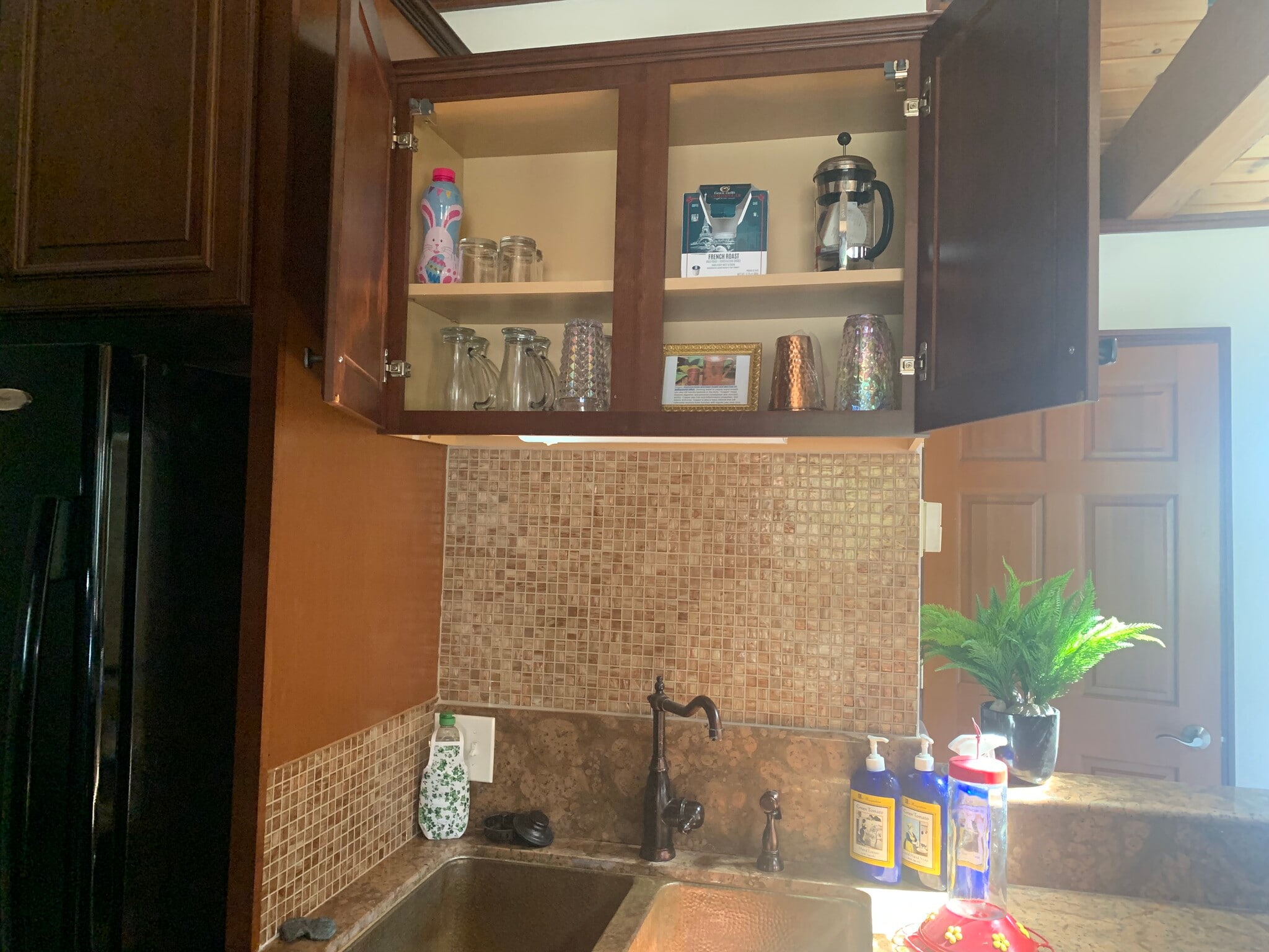 Cabinet above your copper sink - 14715 Greenleaf St