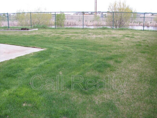 Building Photo - 9302 W Caelen Ave