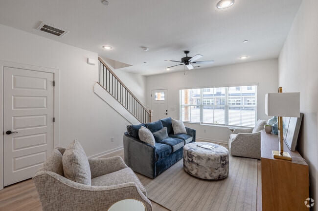 2BR, 2.5BA - 1,250 SF - Living Room - Garland Luxury Living