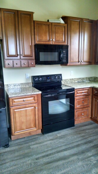 Granite countertops and High end cabinetry - 1 E. Main St.