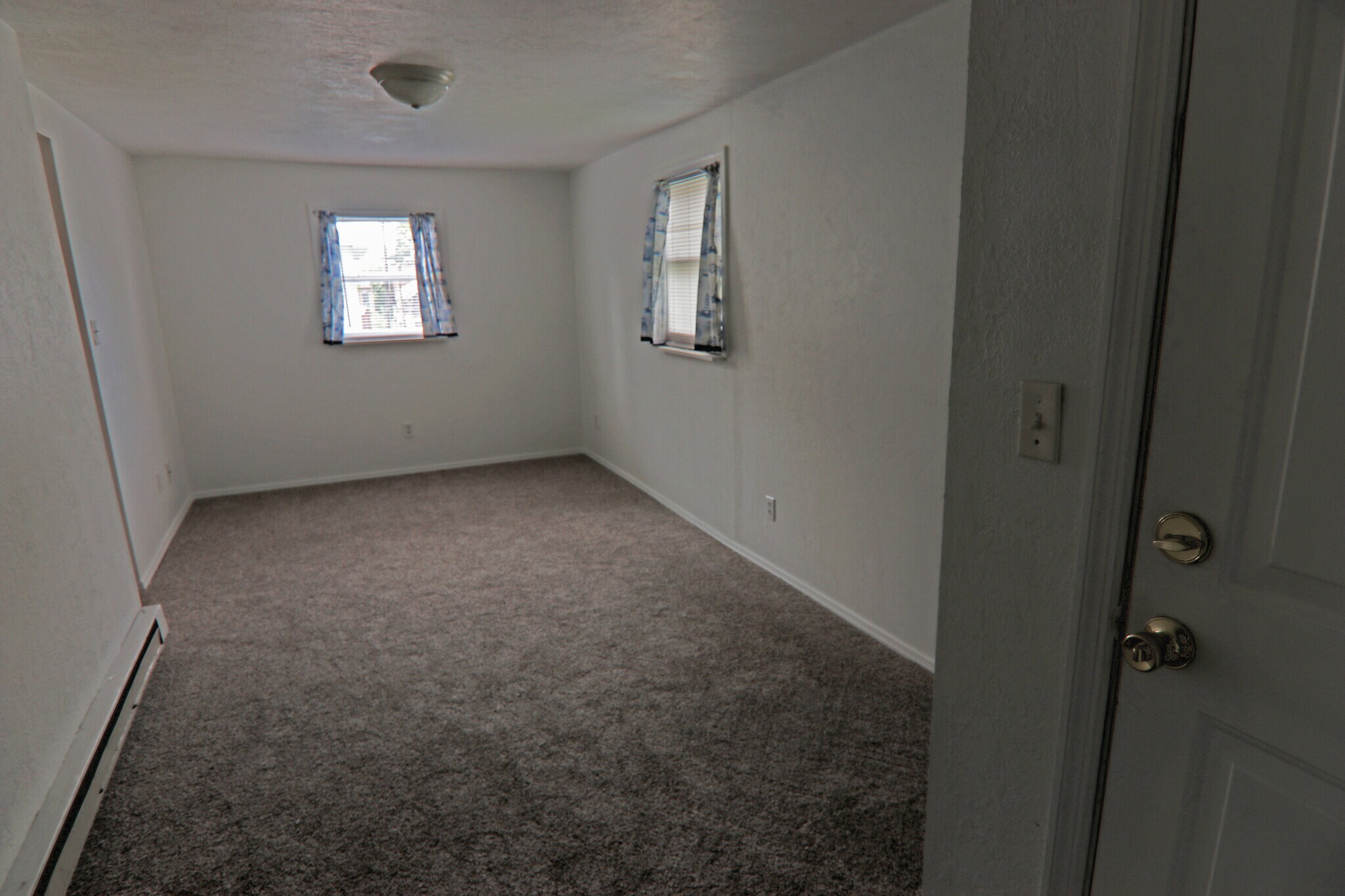 2nd floor living/common room facing east. - 348 Chittenden Ave