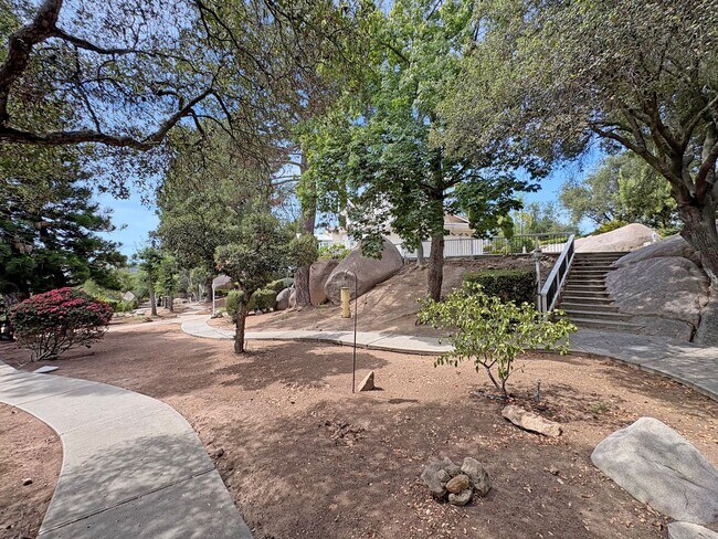 Building Photo - Hilltop Retreat with Pool, Garden & Panora...