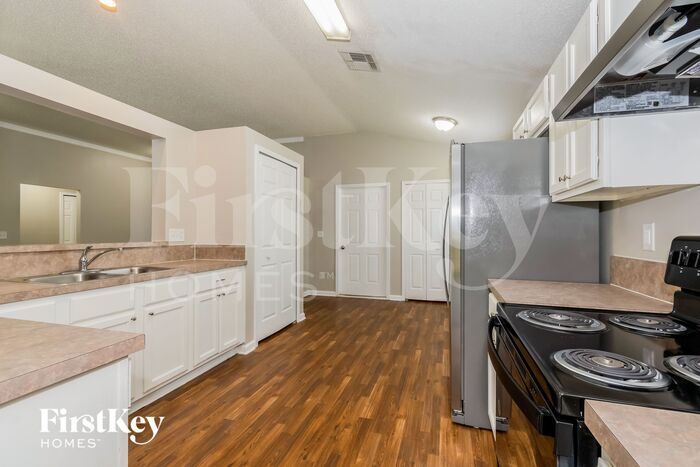 Building Photo - 6935 Pleasure Way